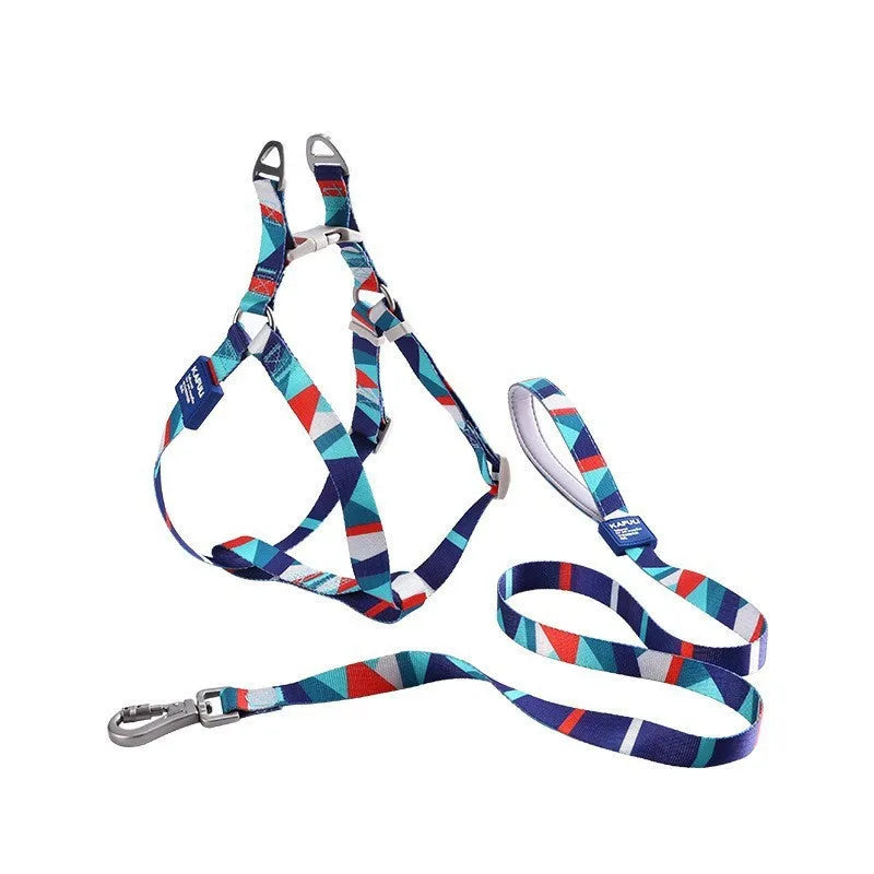 Blue polyester dog vest with attached haulage rope set on adjustable chest strap.