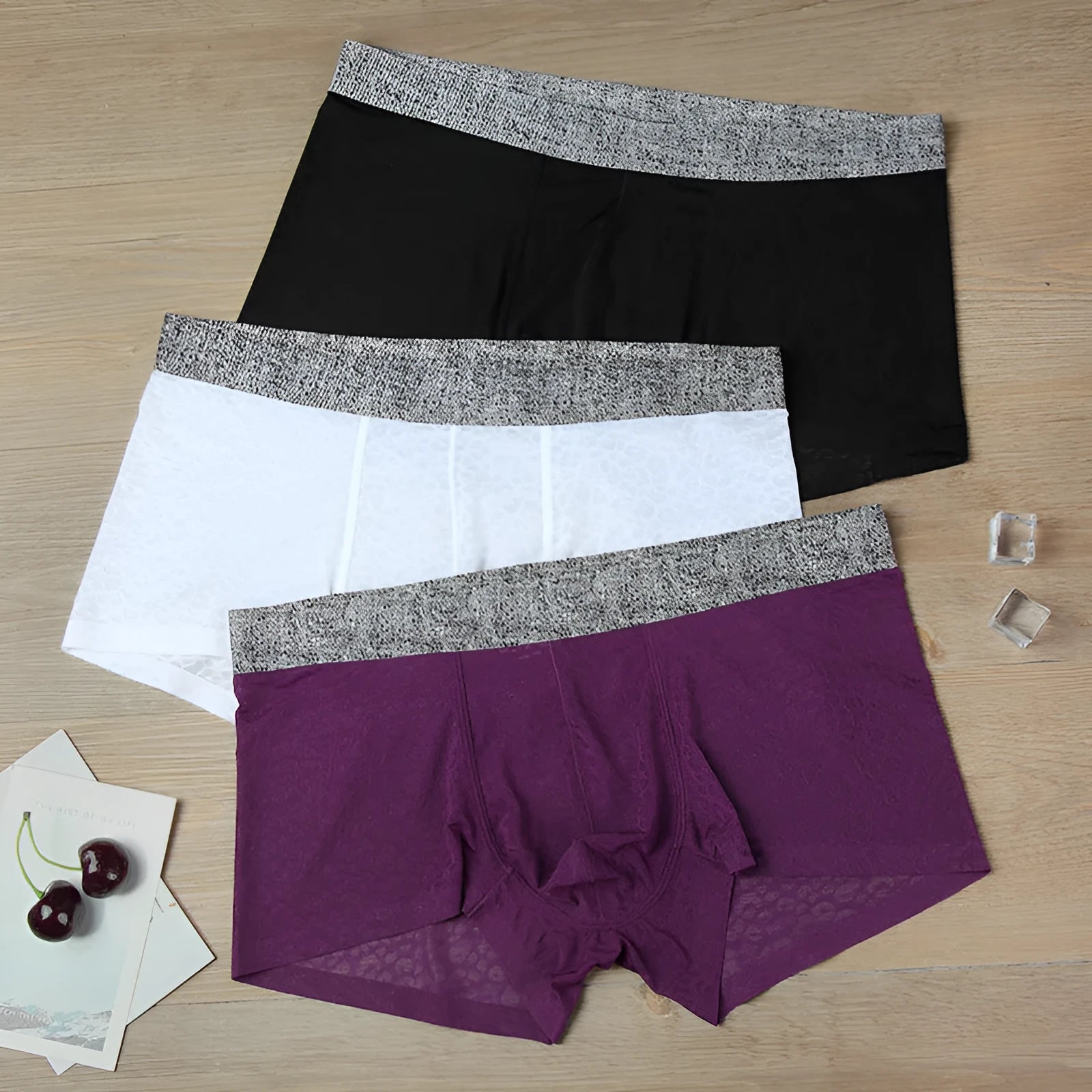 Men's seamless lace boxer briefs in purple colour showing jacquard weave detail
