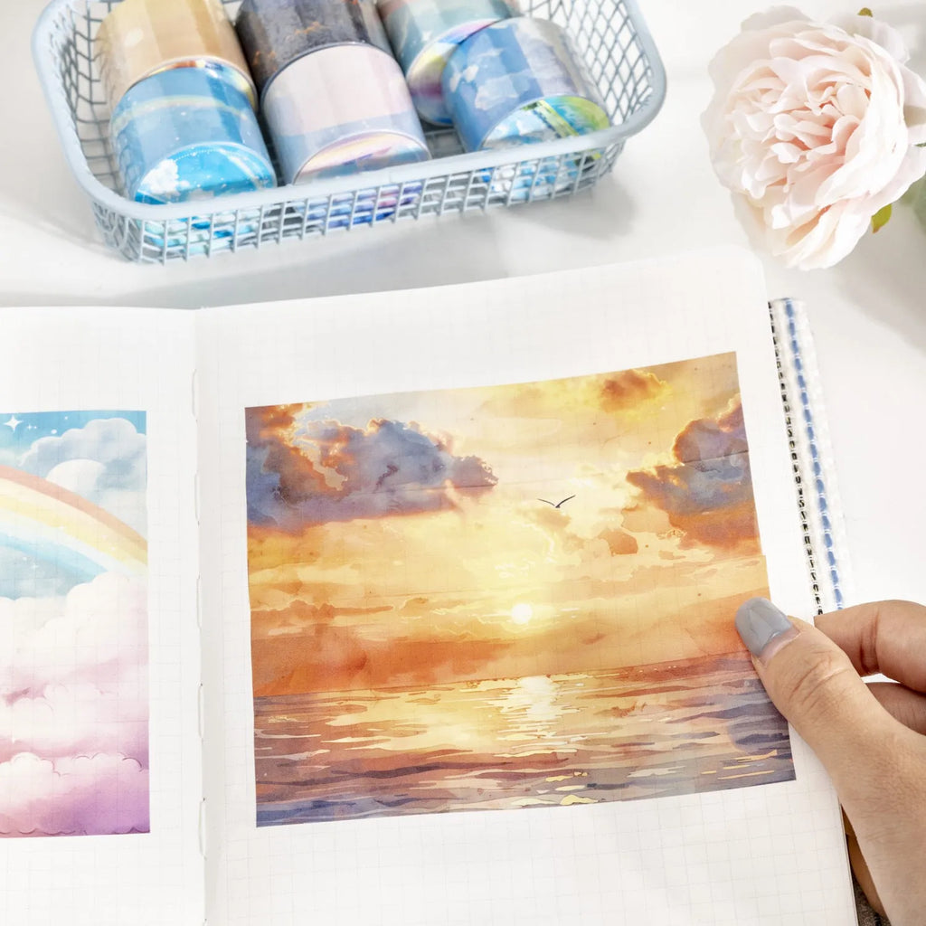 Set of six rolls of Japanese paper sky theme decorative washi tape in various colour designs.