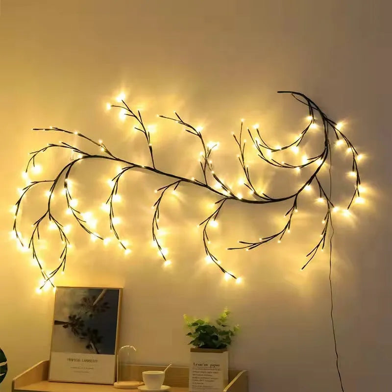 Flexible LED vine garland with birch bark texture and 144 warm white lights bent into decorative shape