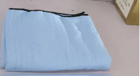 Pure colour seersucker cooling air-conditioning quilt laid flat on a bed