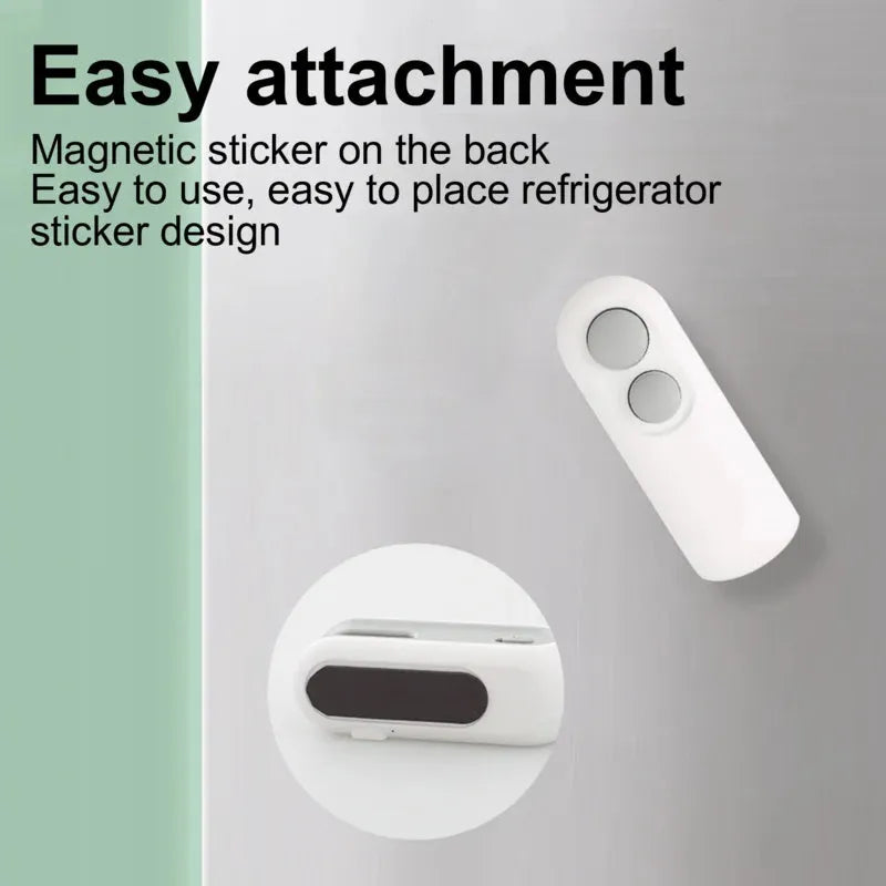 White and blue handheld USB rechargeable bag heat sealer with cutter blade on a kitchen counter.