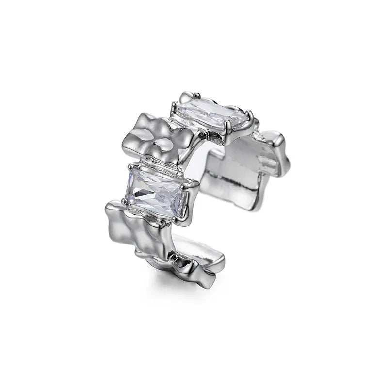 Silver geometric open ring with cross design and zircon centrepiece