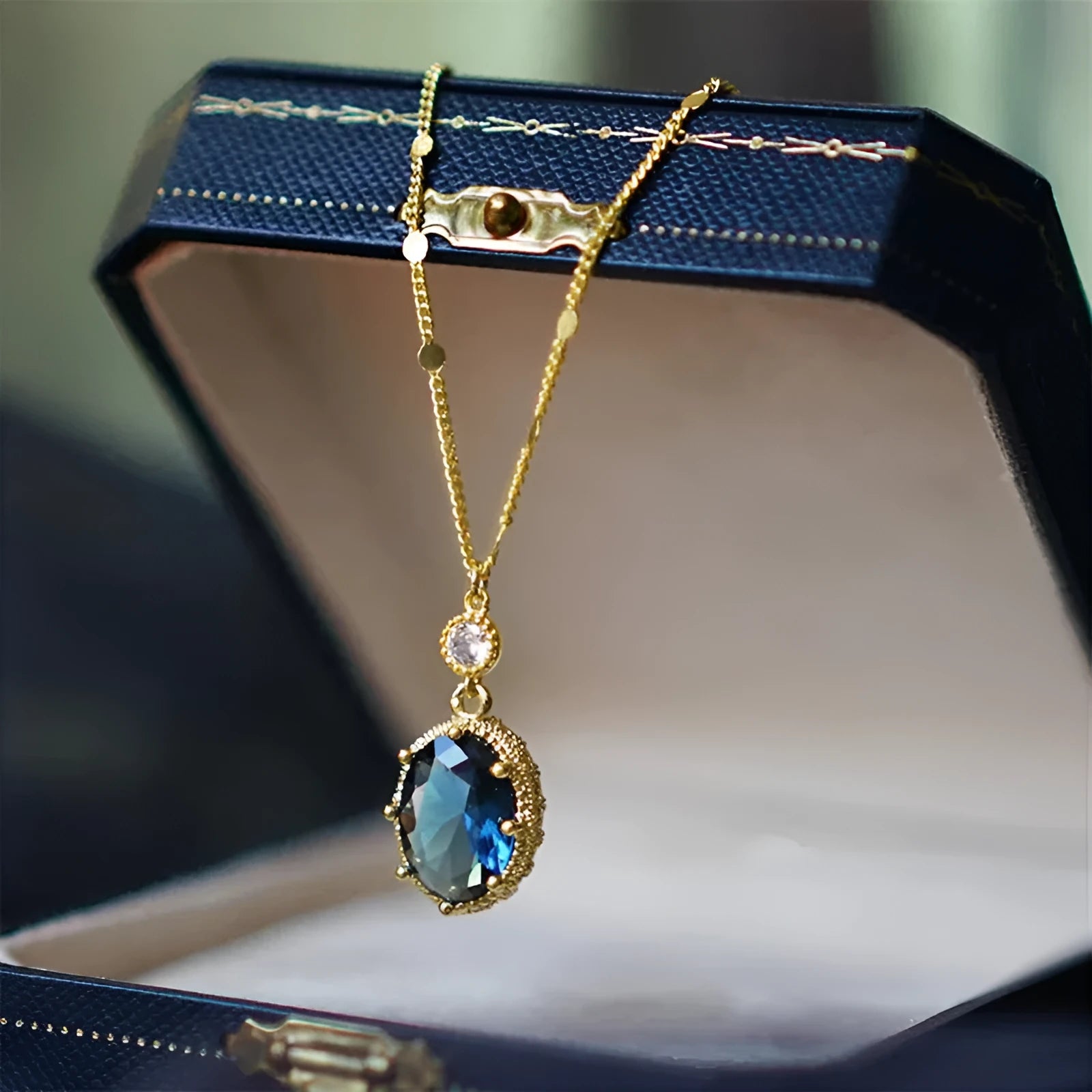 Gold geometric pendant on a French retro style copper chain necklace.