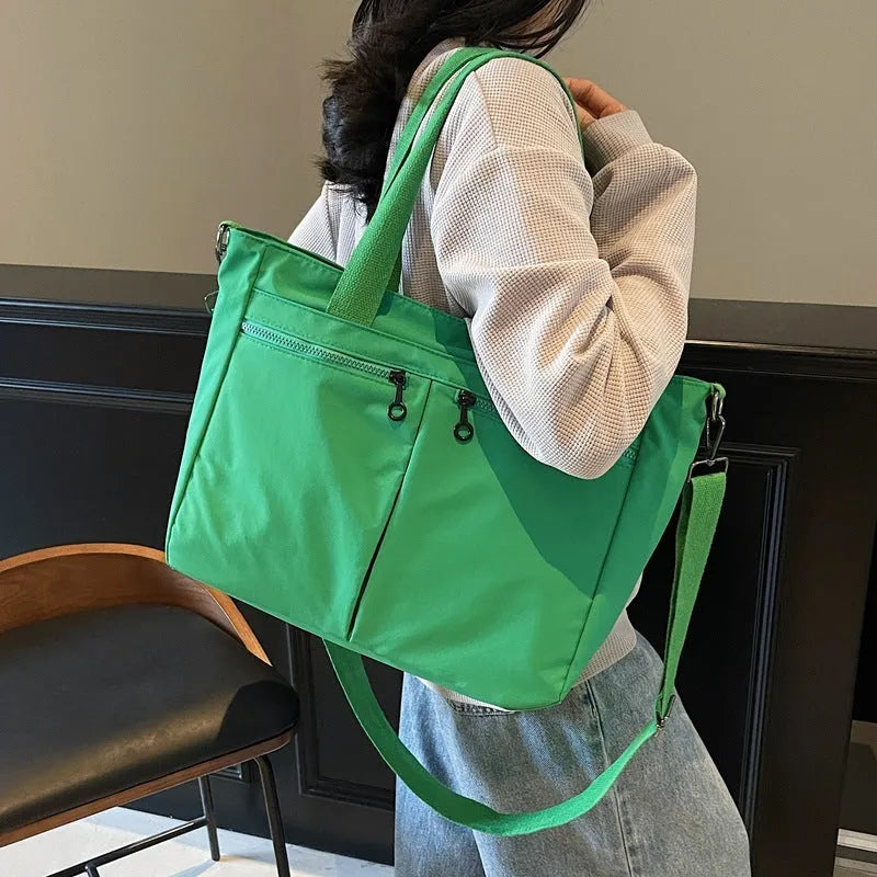 Large capacity solid colour messenger bag in Oxford cloth with 36-55L storage