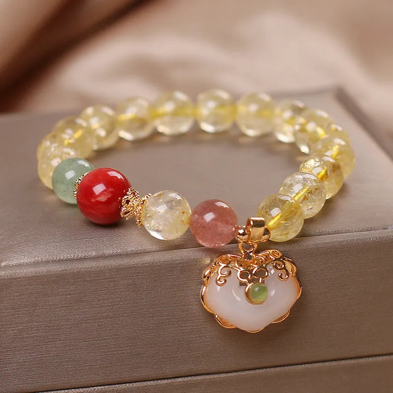 Women's citrine jade ruyi pendant bracelet with yellow crystal detail on alloy metal