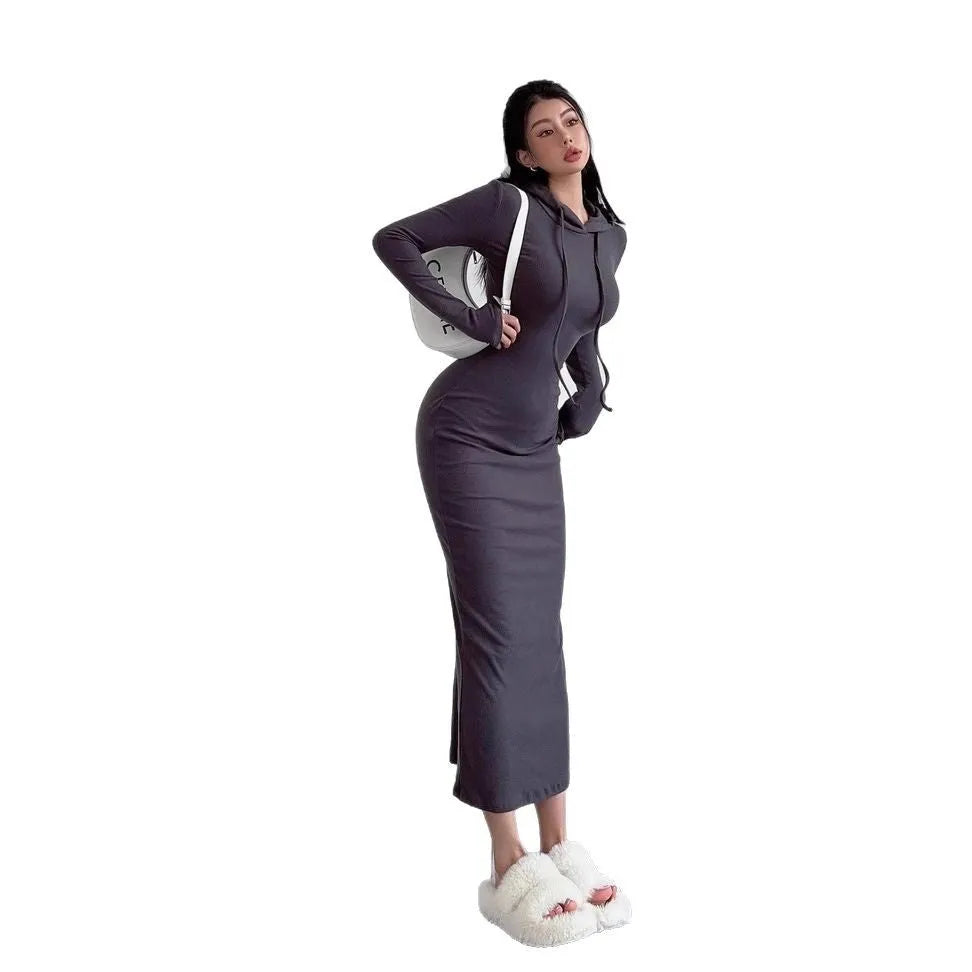 Women's grey hooded long sleeve sheath dress with a high waist on a model.