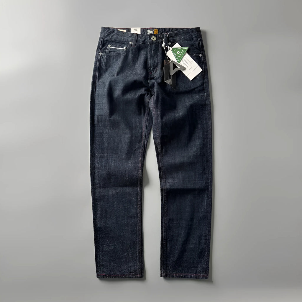 Men's straight leg denim jeans in a primary colour, showing front view of the mid waist and classic cut.