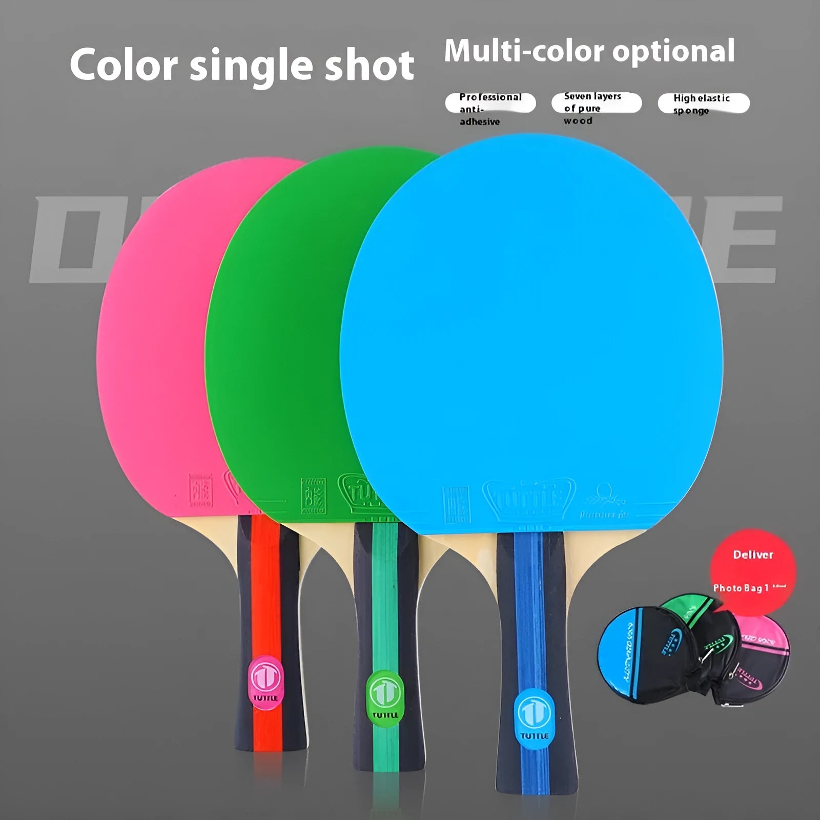 Blue, green, and pink shakehand grip table tennis rackets with matching racket covers laid out.