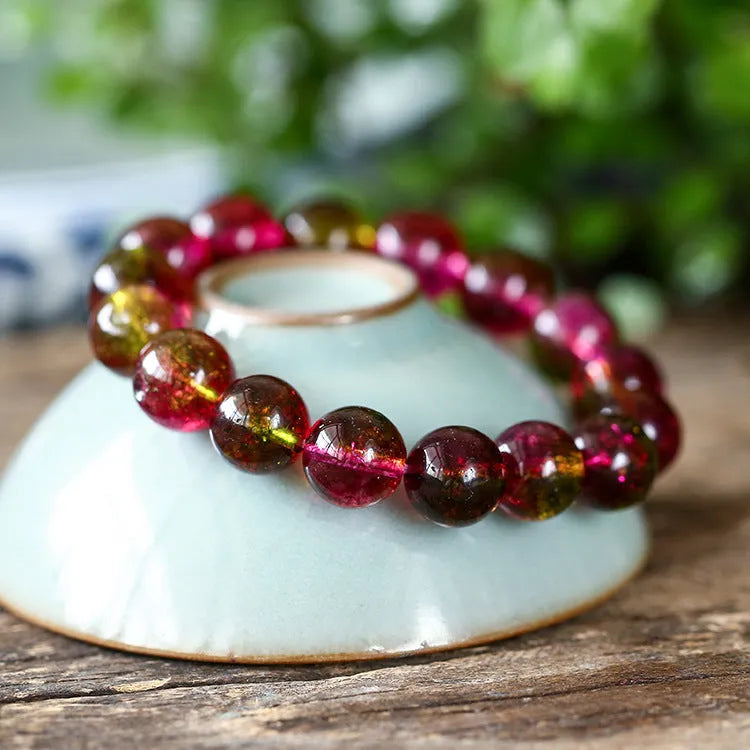 Women's watermelon crystal bracelet showing green and pink striped pattern, available in multiple sizes.