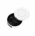Mini black and white semi-in-ear wireless headphones with a compact charging case.