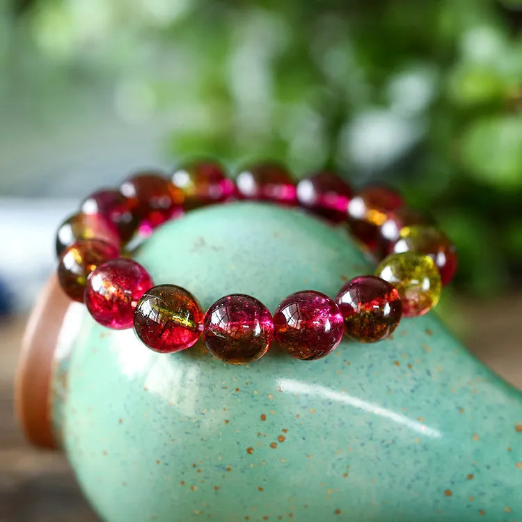 Women's watermelon crystal bracelet showing green and pink striped pattern, available in multiple sizes.