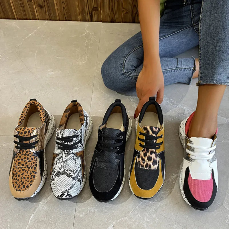 Women's casual sneakers with wedge heel in leopard print, suede upper, and plastic sole