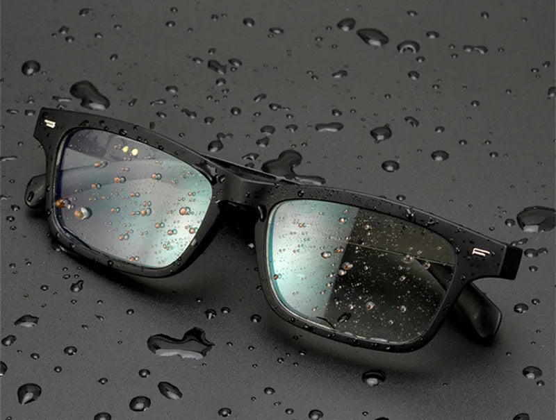 Smart Bluetooth glasses with open-ear speakers built into the temples, shown with a polarised lens option.