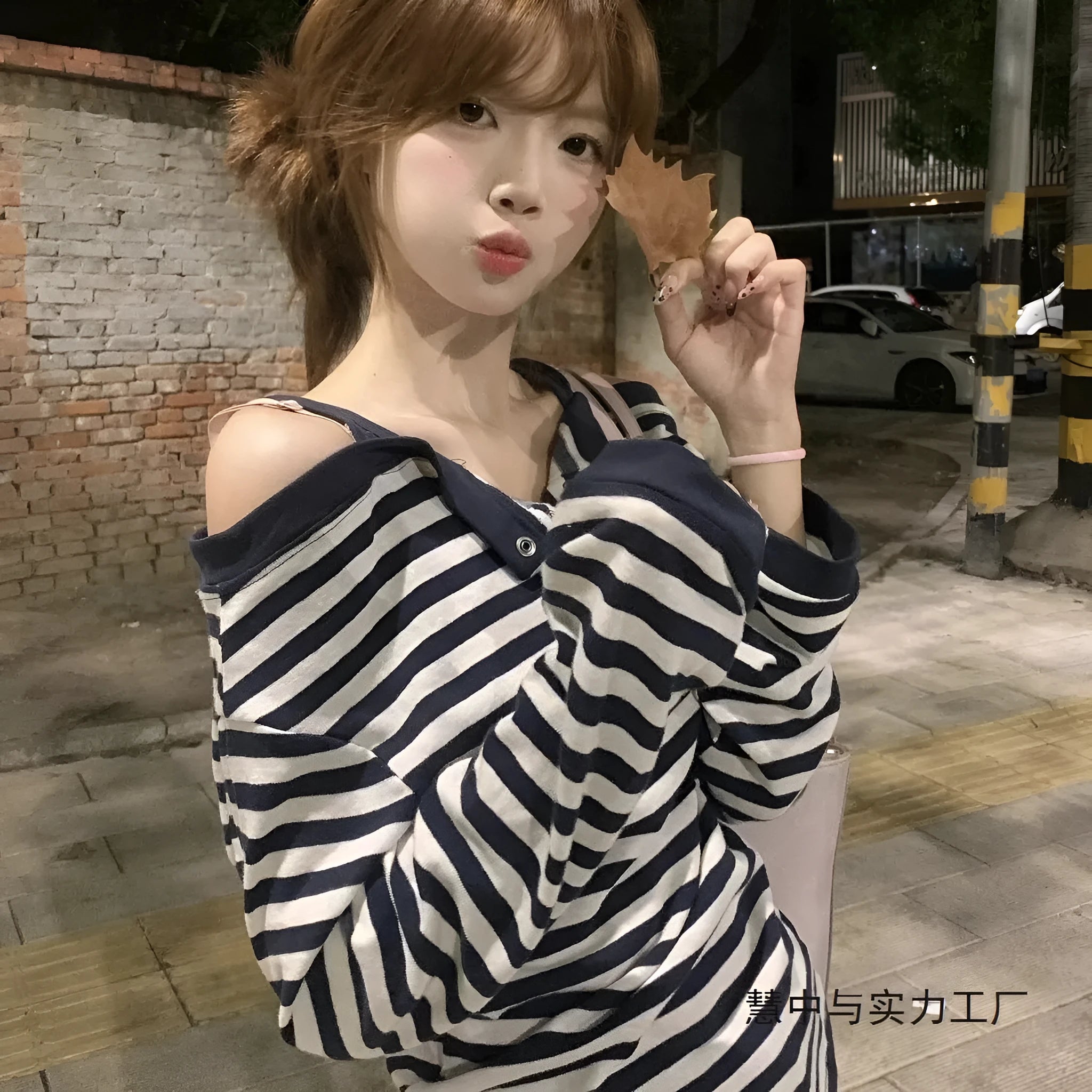 Dark blue Korean-style oversized women's t-shirt with embroidery details and long sleeves