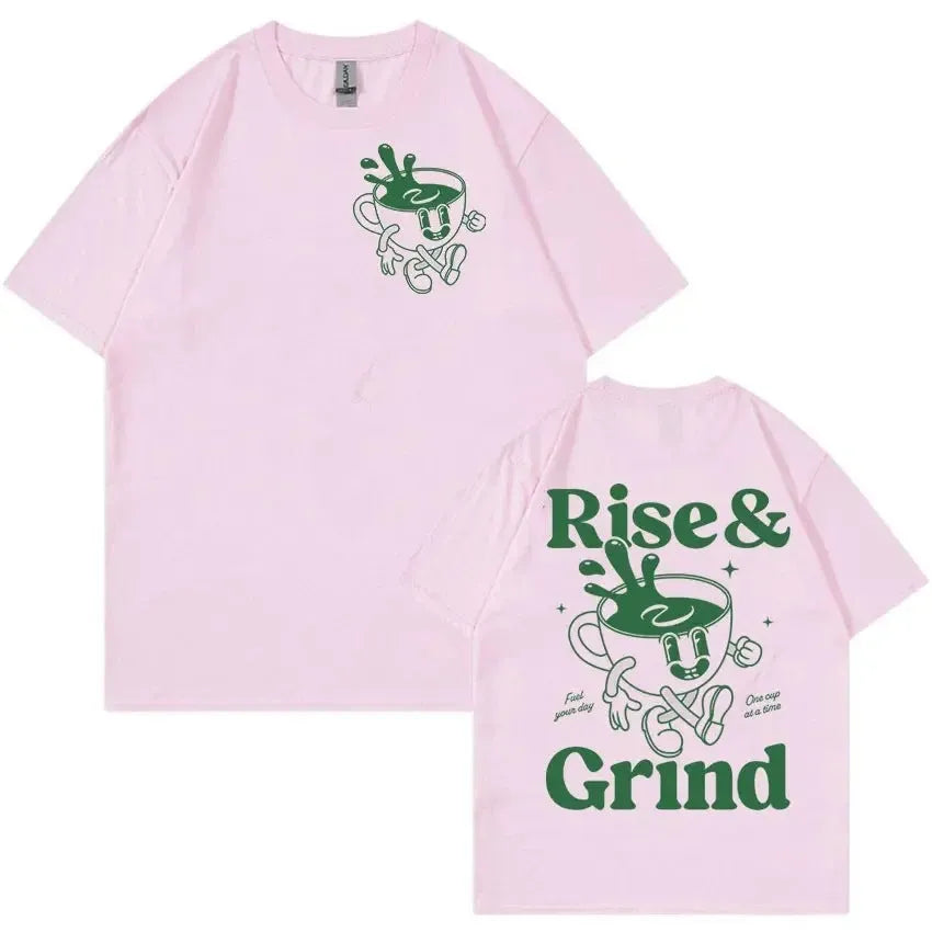 Man wearing a loose grey linen t-shirt with a Rise and Grind Green Coffee cartoon print design.