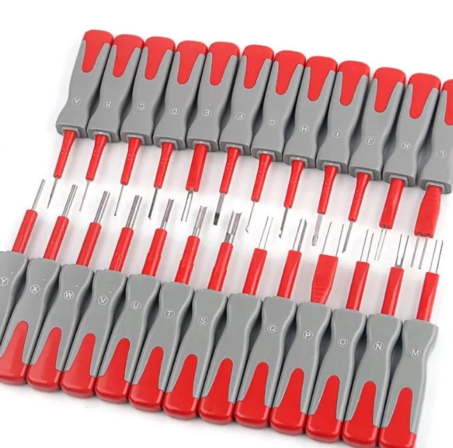 Set of 25 car terminal removal tools and pull-out keys for electrical harness disassembly.