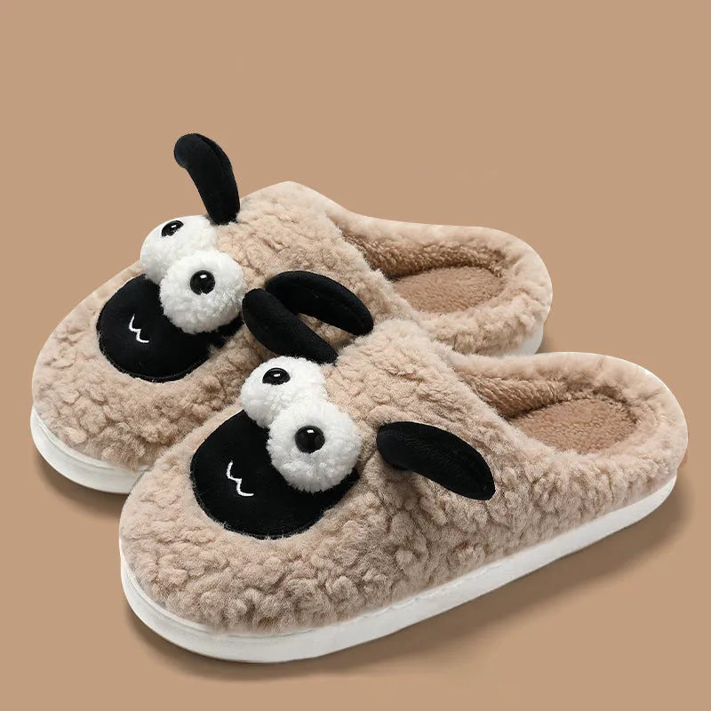 Brown lamb thermal cotton slip-on slippers with suede upper and PVC sole on a wooden floor.