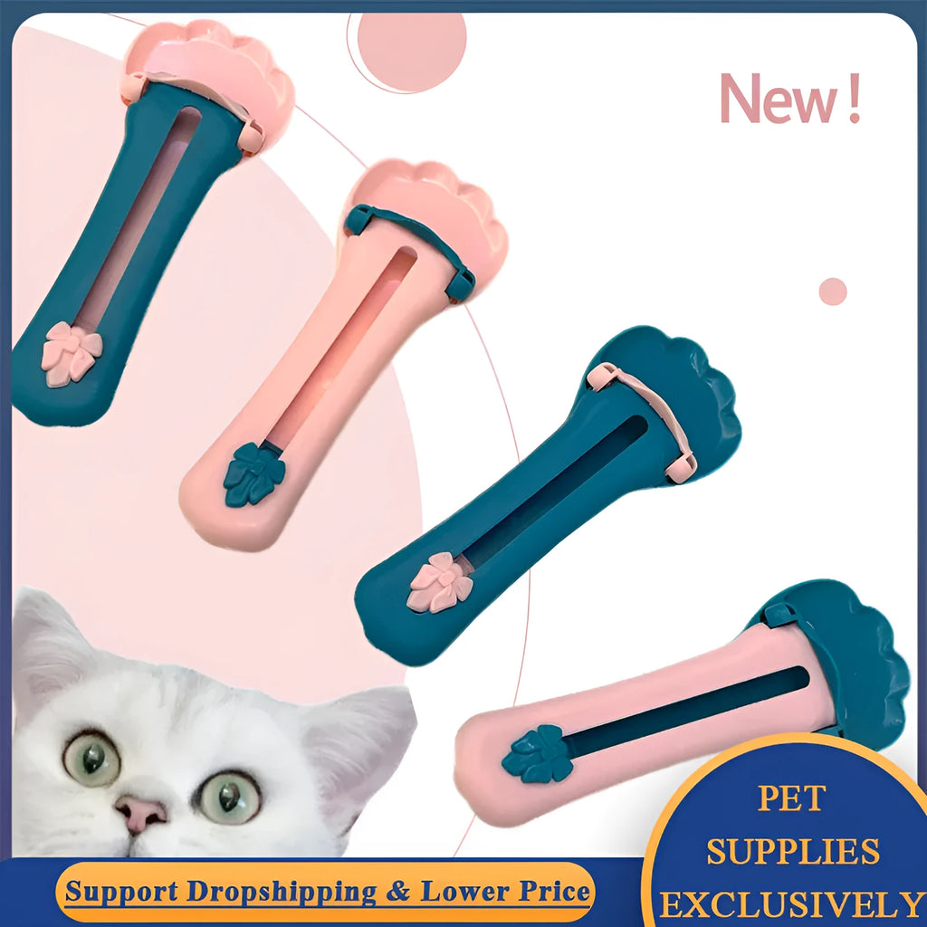 Green and pink silicone pet food spoon with squeezer function for dispensing treats and liquid food to cats and dogs
