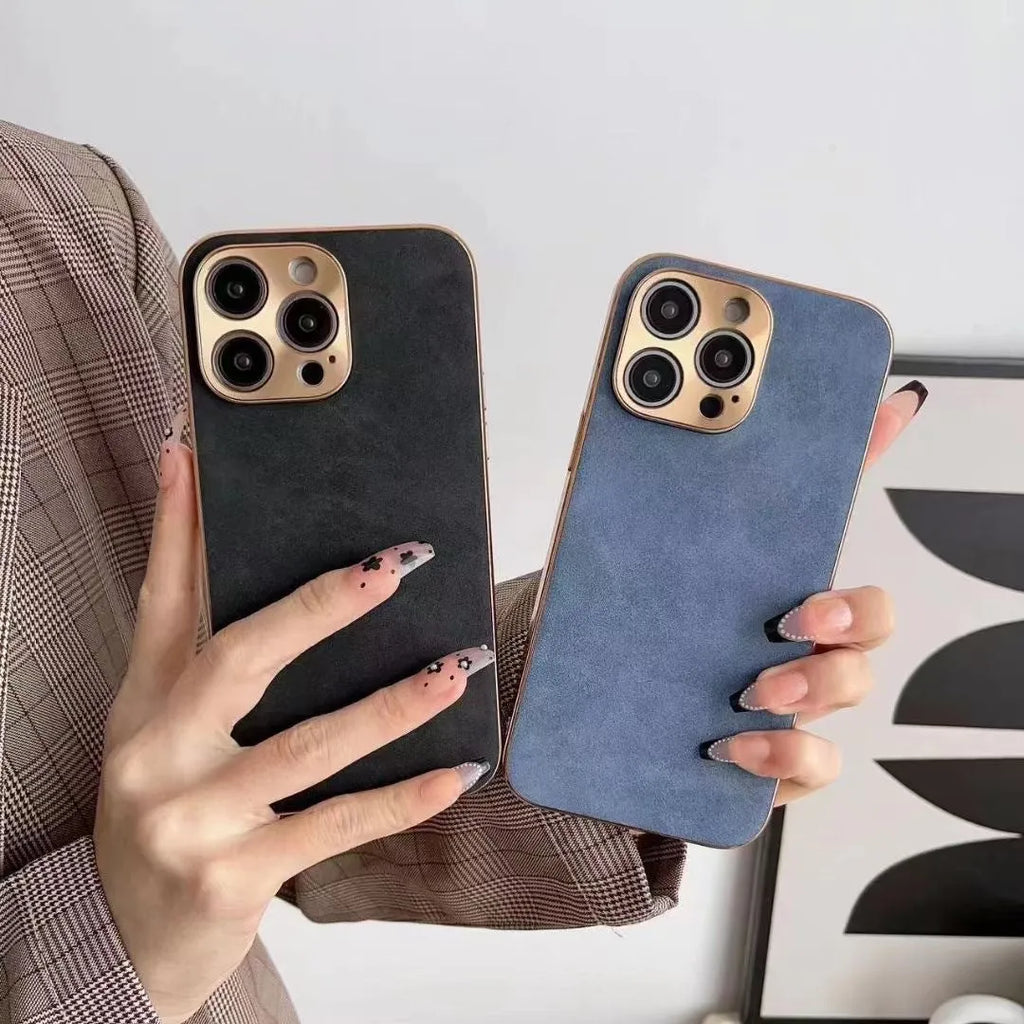 Solid colour leather texture TPU phone case for iPhone on a table, showing grey-green colour option.