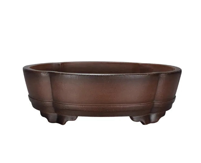 A rectangular purple clay bonsai pot with a simple classical design, shown on a tabletop.