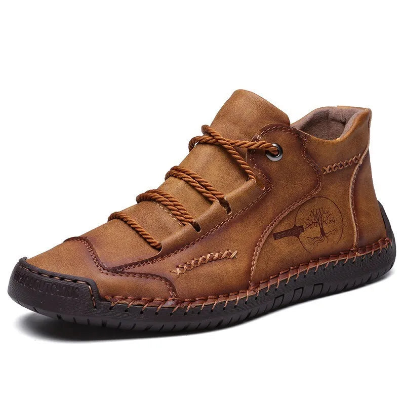 Men's brown cowhide leather high-top boots with rubber sole and front laces on a white background.