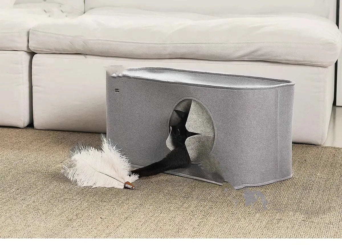 A khaki-coloured foldable felt cat nest for use inside pet cages.