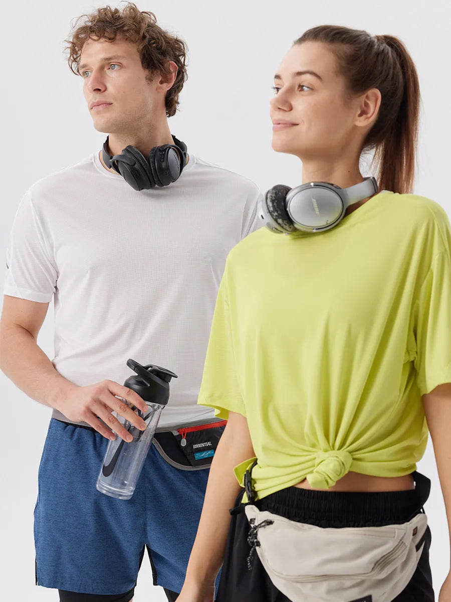 Men's straight-leg sports shorts with side slits in turmeric yellow colour, showing athletic design with micro elastic nylon fabric