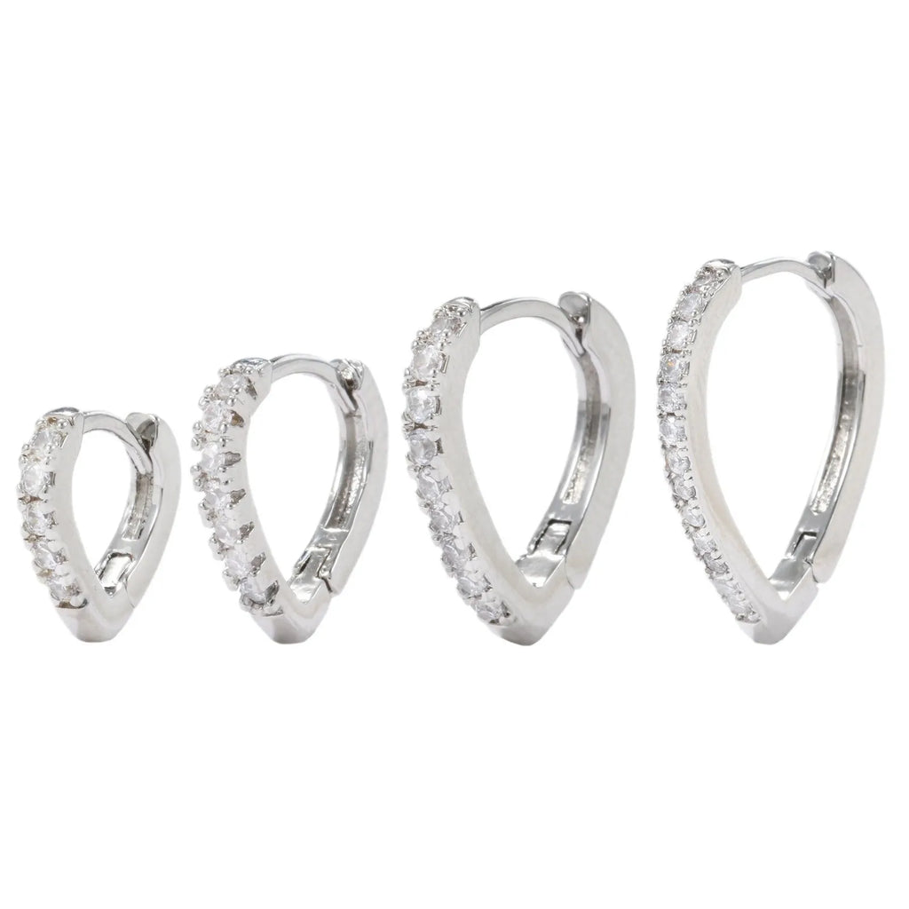 Electroplated copper ear clip with heart geometry design in gold and white gold colour options