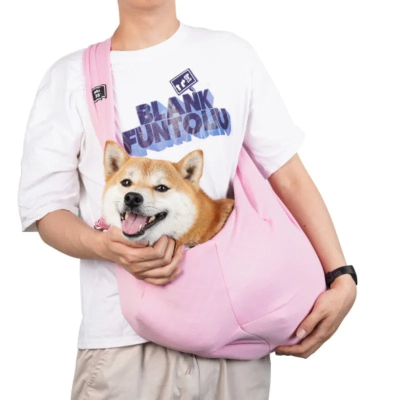 Folding cat carrier backpack shown in blue with large mesh ventilation windows and adjustable shoulder straps