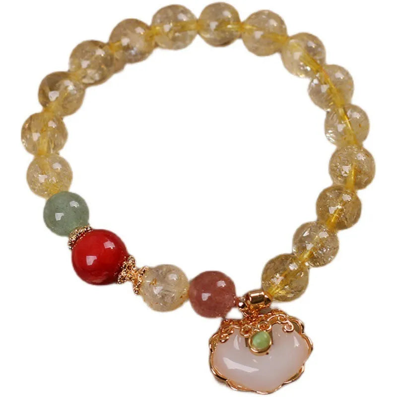 Women's citrine jade ruyi pendant bracelet with yellow crystal detail on alloy metal