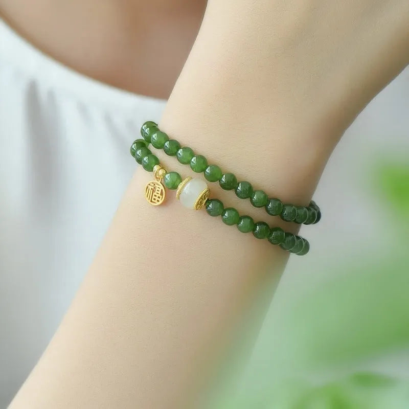 Women's double circle Hetian jade bracelet with engraved fu character in geometric design