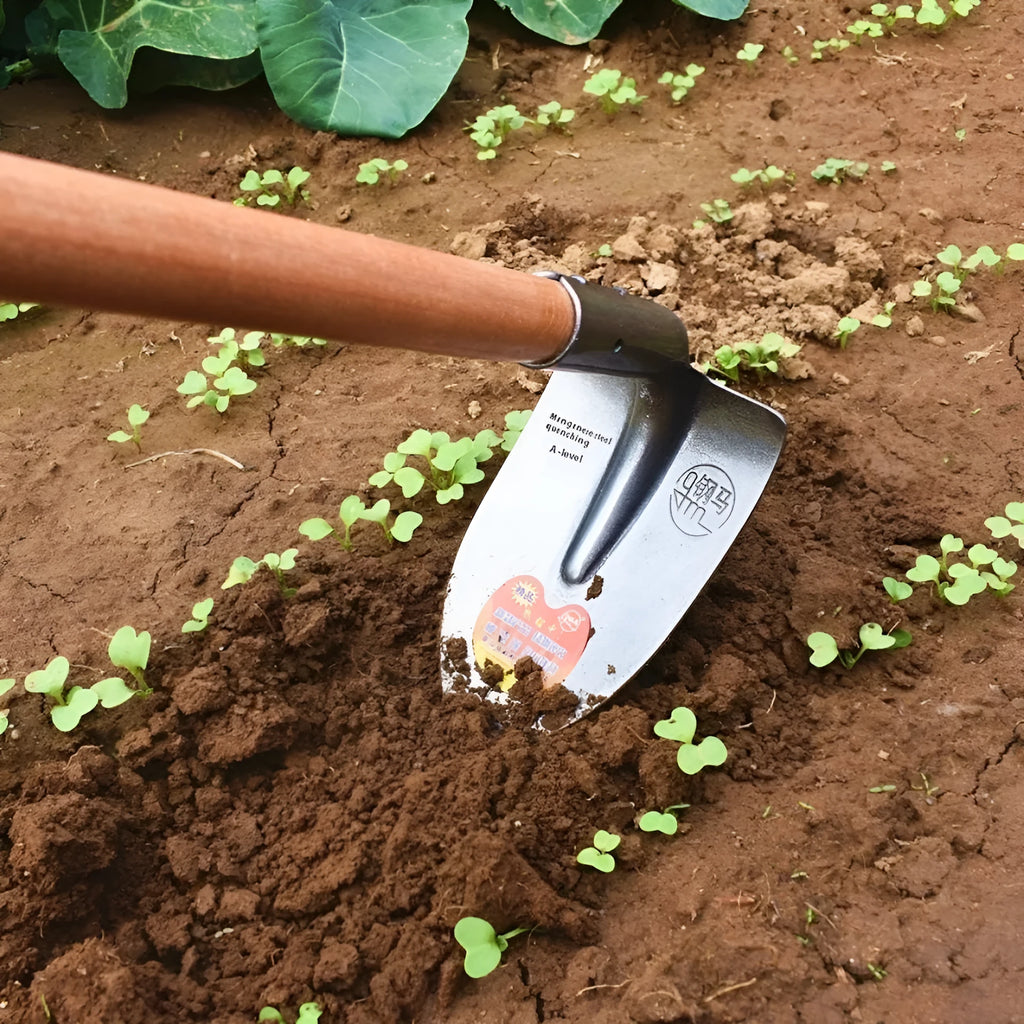 A pointed flat garden hoe with a manganese steel and stainless steel blade for weeding and soil cultivation.