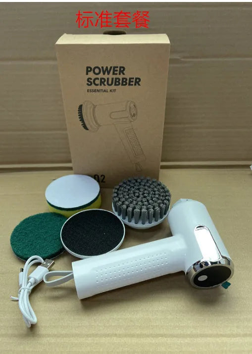 White cordless electric cleaning brush with interchangeable heads on a kitchen counter