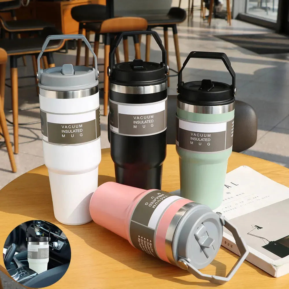 30oz stainless steel insulated travel tumbler with handle and cover in assorted colours.