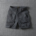 Men's straight cut cotton cargo shorts in army green with multiple pockets