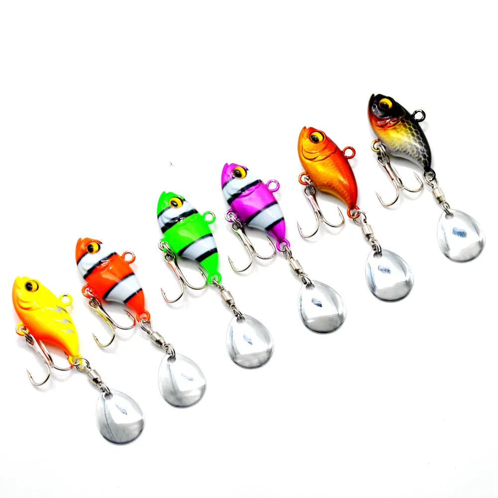Metal sea fishing lure with rotating sequin in multiple colour options including zebra patterns
