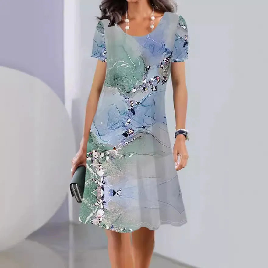 Women's light blue floral print A-line midi dress with short sleeves on a hanger.