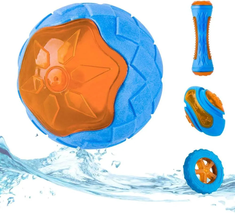 Set of four floating TPR dog toys: a ball, a barbell, and two tires with bumpy textures.