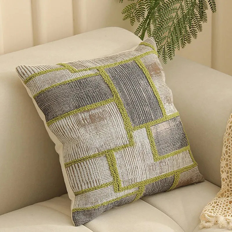 Square 45cm retro jacquard cushion cover with a woven plants and flowers pattern in a Nordic style, shown in one of eight available colours.