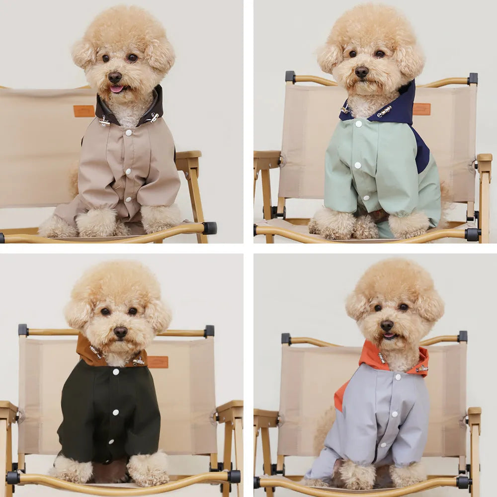 A khaki coloured British style waterproof shell jacket on a small to medium sized dog.