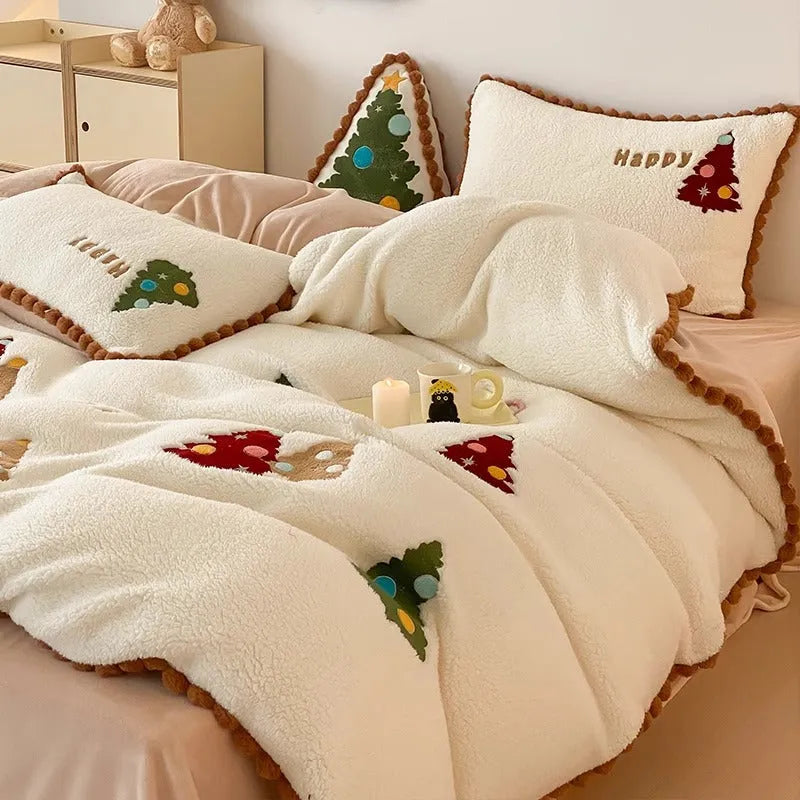 Bright yellow fleece-lined Christmas tree cartoon pattern quilt cover and pillowcases from a four-piece bedding set.