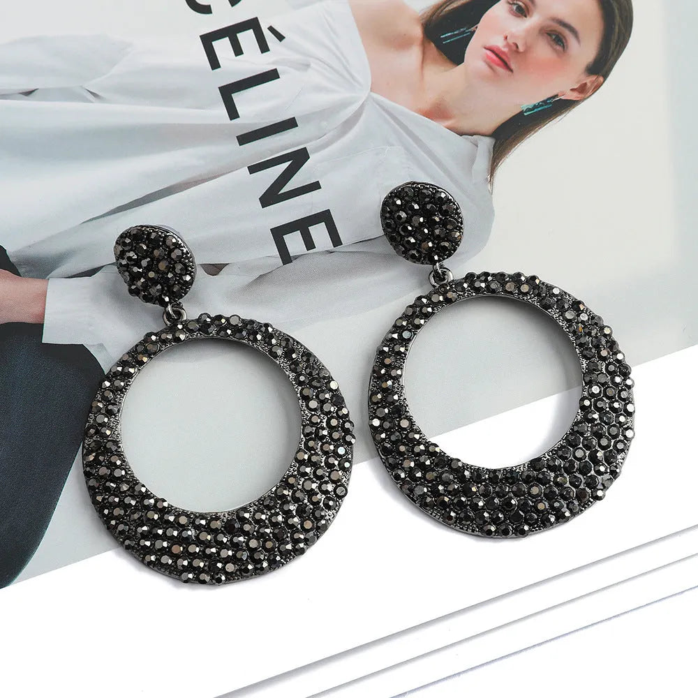 Cartoon style alloy earrings with large round colour pendants