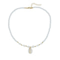 White bead necklace with conch-shaped mother of pearl shellfish pendant and regular chain