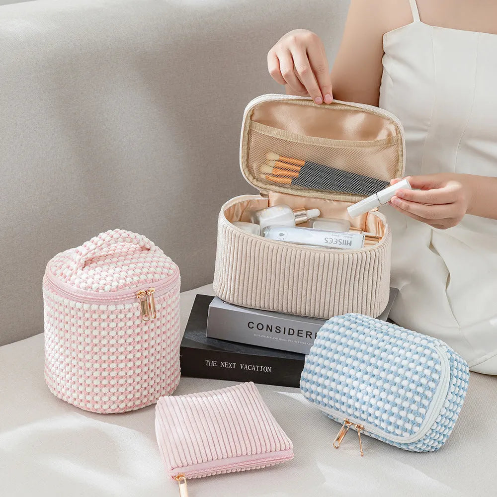 Flannelette makeup bag four-piece set in cube style, shown in blue with dots colour.