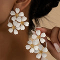 Retro flower earrings for women in black or white with iron metal and baking varnish finish