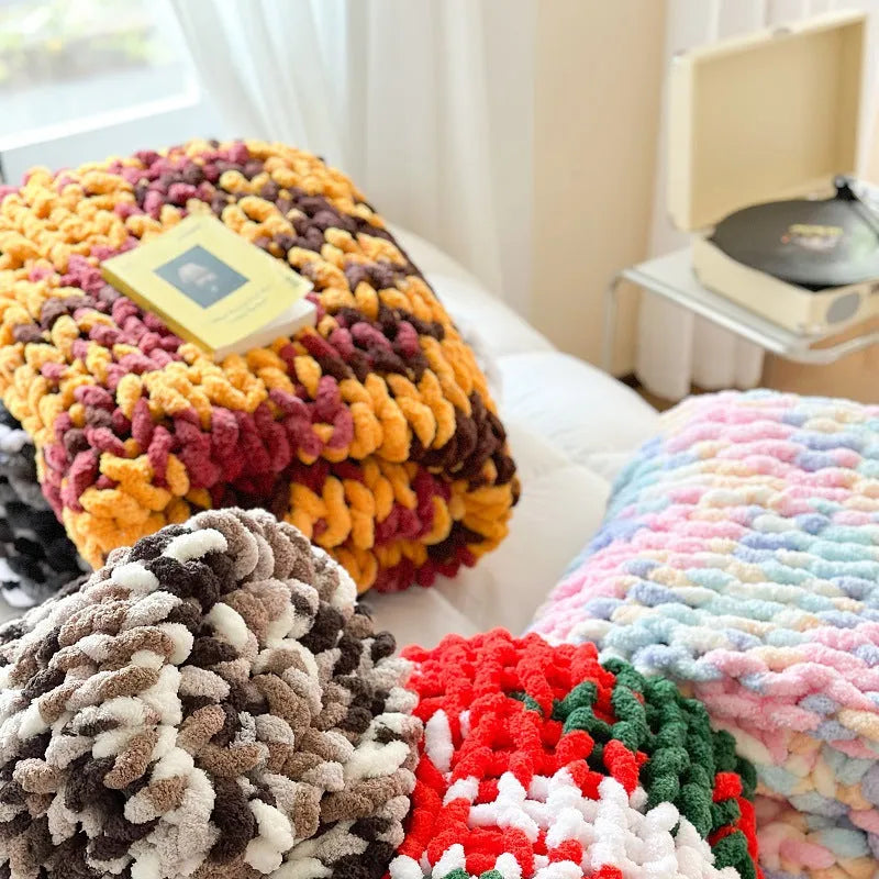 Thick striped chenille cover blanket in Caramel Mango colour folded to show texture and size.
