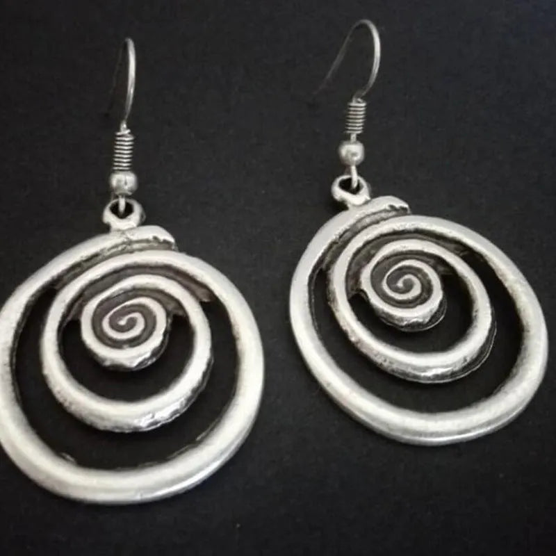 Silver geometric spiral distressed earrings with vintage ethnic style design