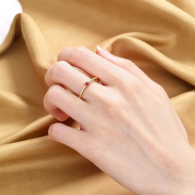 Women's personalised twin style copper geometric circle ring with single diamond in white, red, green, or blue colour