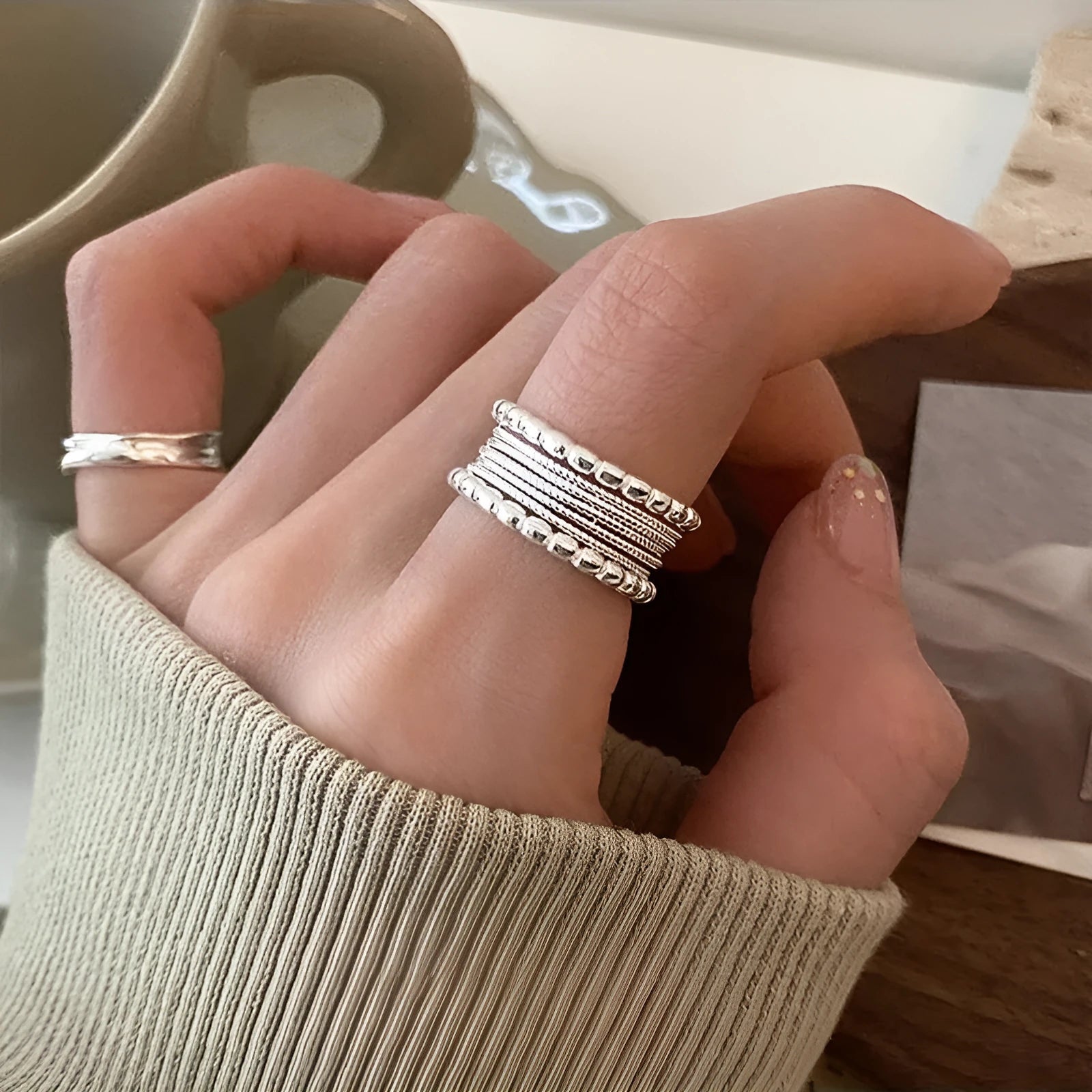 Adjustable geometric copper ring with woven twisted multilayer design
